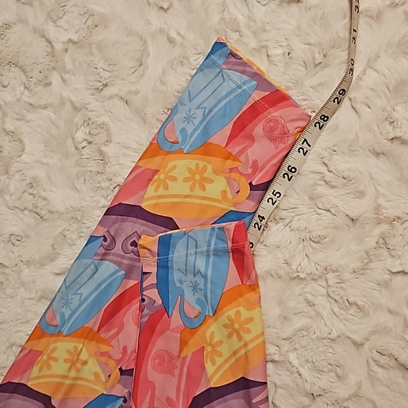 DISNEY Alice in Wonderland tea cup leggings Medium EUC sold out in parks! - Picture 6 of 7